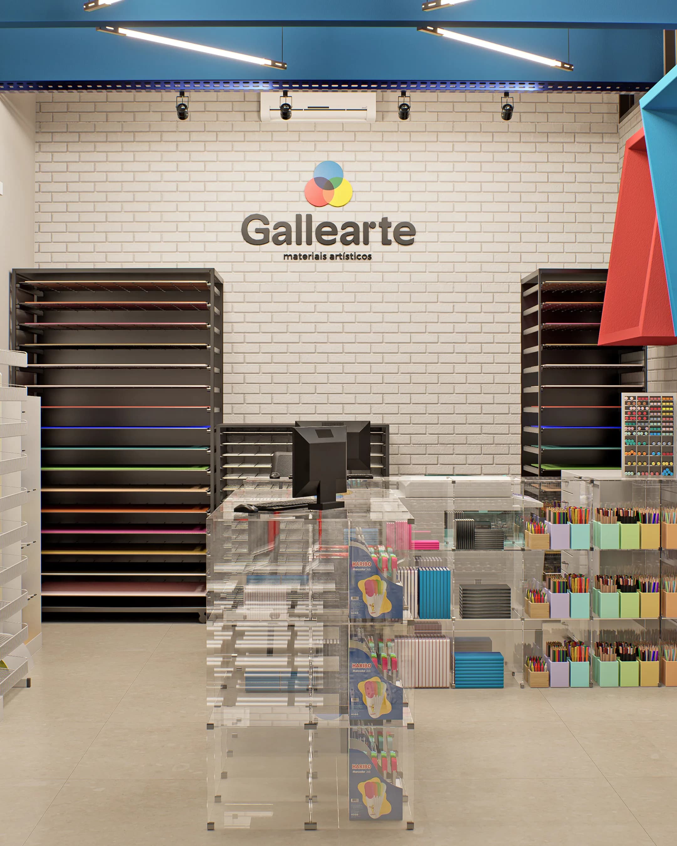 Interior da Gallearte com o logotipo na parede de tijolinhos brancos, estantes pretas de papéis e expositores de acrílico com lápis coloridos.