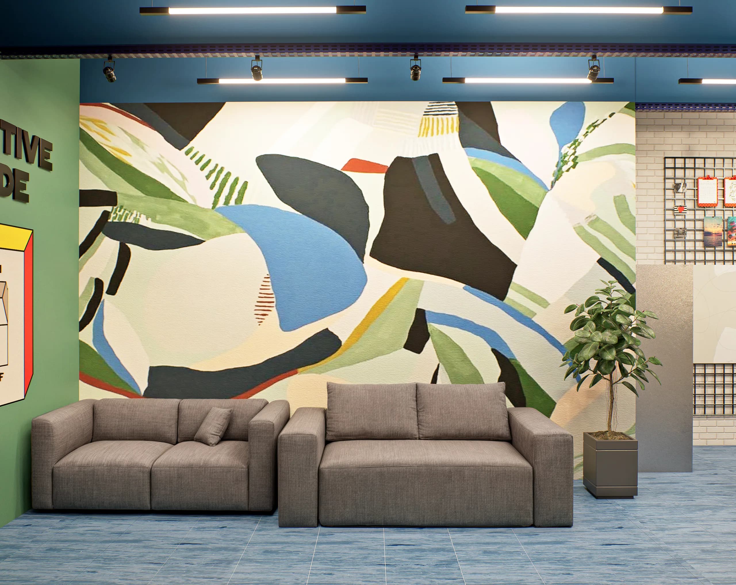 Sala de convivência do Diretório Acadêmico com dois sofás cinza diante de um grande mural de formas coloridas, piso e vigas azuis.